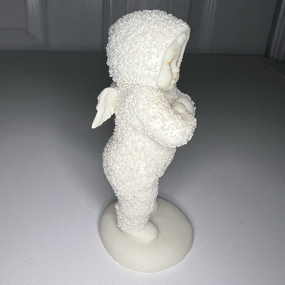 Department 56 Snowbabies figurine, likely titled 
